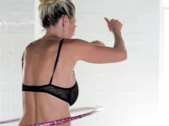 Busty MILF pornstar Puma Swede hula hooping naked