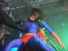 Super heroine is caught and gets tied up and her boobs sque