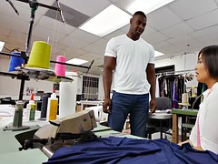 Milcah Halili sucks huge black cock in tailor shop