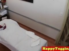 Tanlined asian jerking during massage