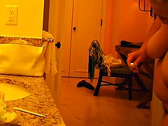 mature mom on hotel bathroom spycam