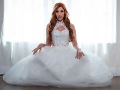 Gorgeous redhead hottie Lauren Phillips jumps on a big wiener