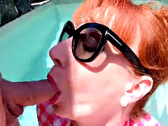 Red XXX masturbates and sucks cock in the pool
