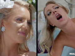 Blonde and brunette hotties kneel to lick each other's cunts