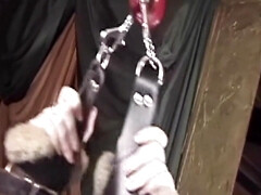 Brunette sub in latex suit dominated with toys and BDSM