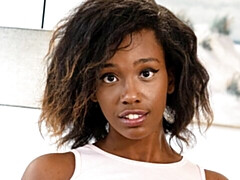 Gorgeous ebony doll Lacey London is fucking with a purple sex toy