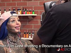 Behind the scenes for Amber Luke's new face tattoo