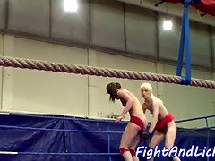 Watch these sexy lezzie babes devour each other's shaved pussies in a wrestling ring
