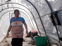 Chubby Girl Getting Naked Out In The Greenhouse
