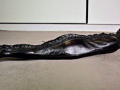 Leather bondage and orgasm