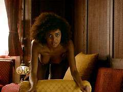 Curly ebony model shows perfect body