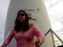 I show my hooters in an industrial park