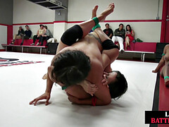 Muscular wrestling lesbians fingering