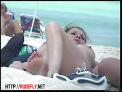 Awesome beach voyeur vid with a hot brunette