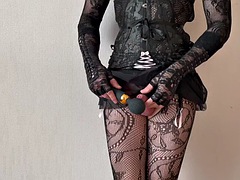 Sissy in hot lingerie masturbates with a toy