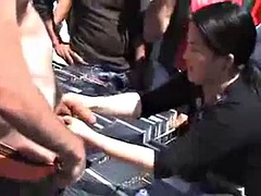 CFNM Trying on cock rings at a public fair