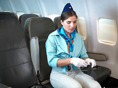 Stewardess removes her outfit after being alone in a plane