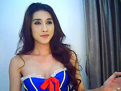 ladyboy having fun on web cam with her playthings and outfits